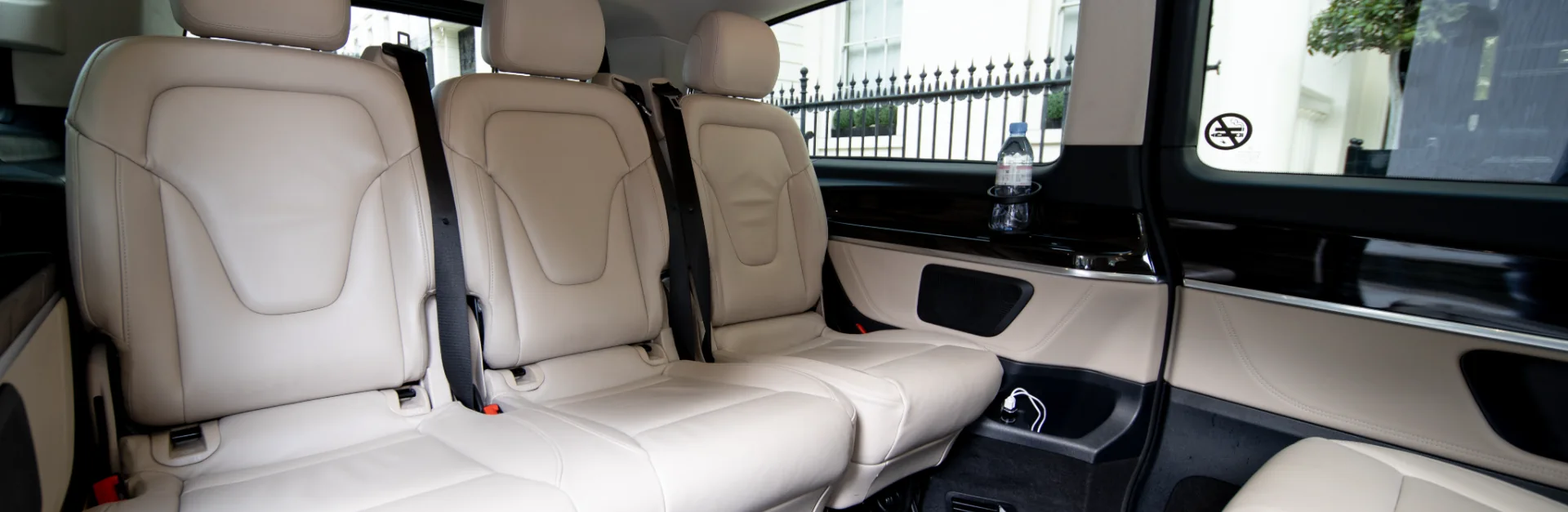 Inside of a large MPV ideal for corporate uses.
